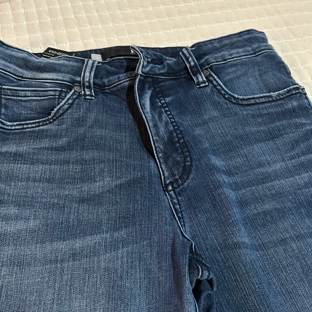 Kit from kloth skinny medium blue jeans.